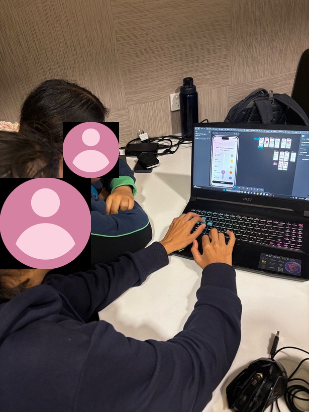 Two participants exploring the Little Sprout prototype during user testing