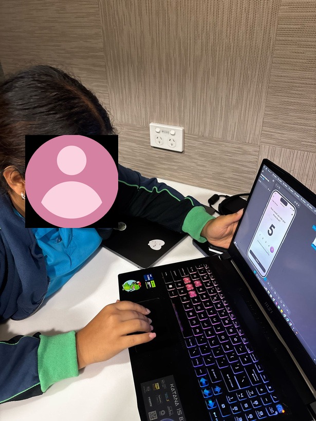 Participant interacting with the Little Sprout app prototype on a laptop